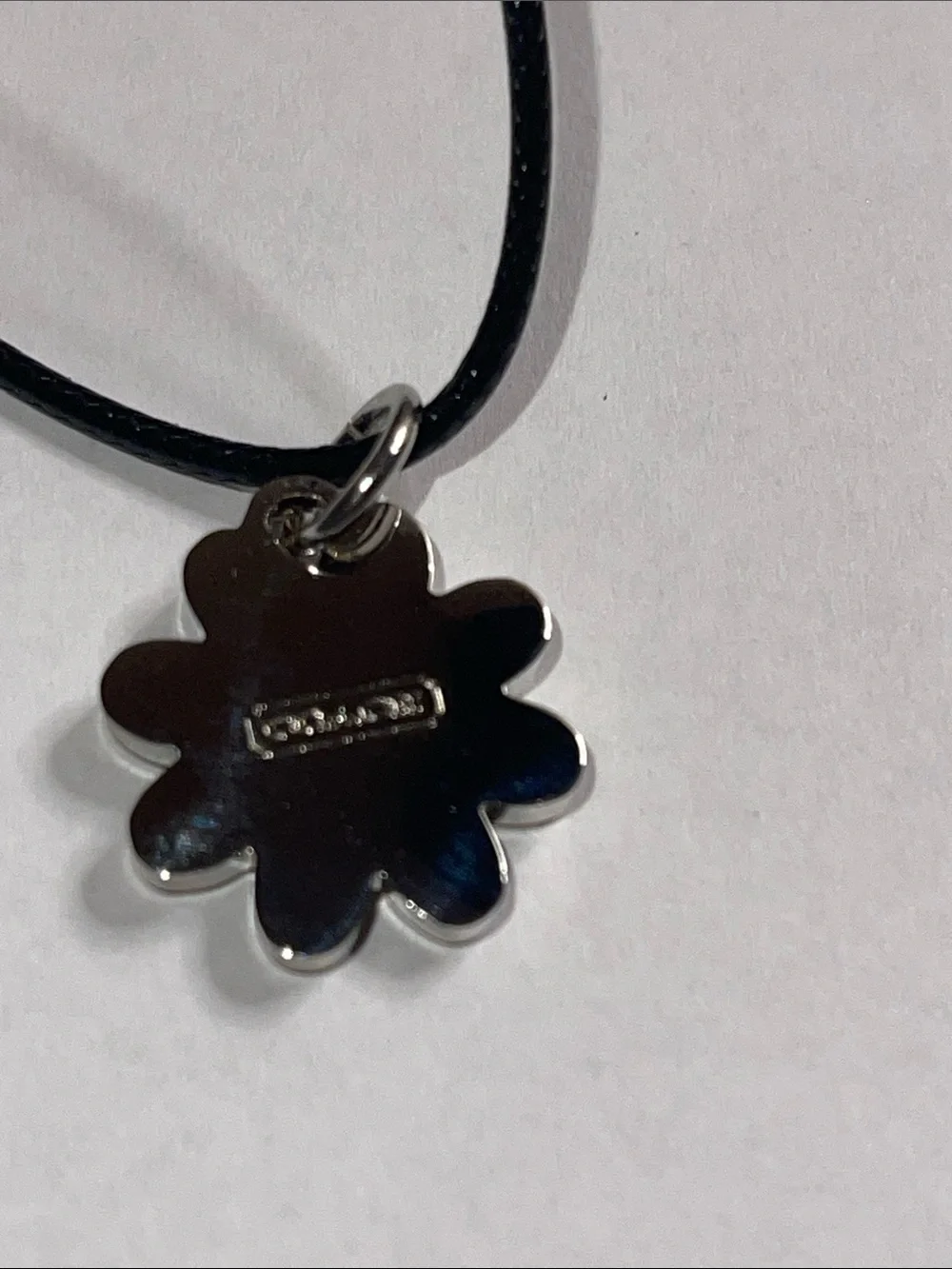 Coach Pale Pink Enamel Daisy Pendant Necklace